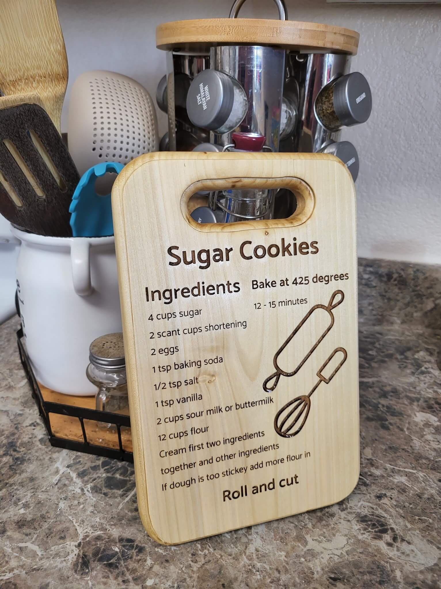 Teal notebook with gold pen on wooden desk